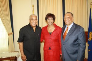 Robert Pickersgill chairman of PNP Outging Opp. Leader Portia and Newly installed Oppositoin Leader pose for Vision at swearng in of Oppsitin Leader