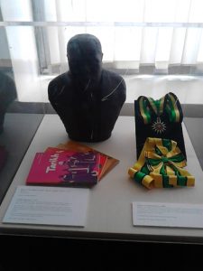 Display of Marcus Garvey's bust and insignias