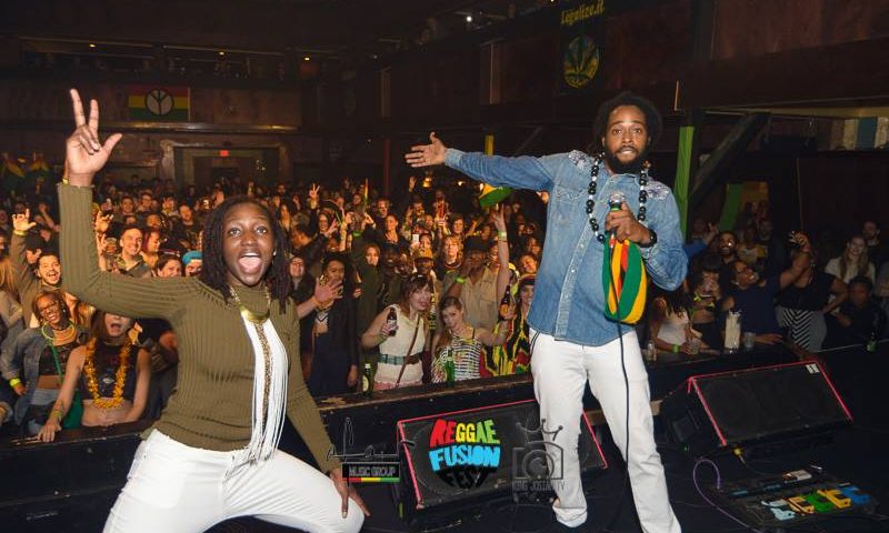 Clara and Jah Ques performing on stage