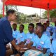 Minister of Culture, Gender, Entertainment and Sport, Olivia Grange speaks to young footballers at the launch of the Digicel Kickstart Clinic