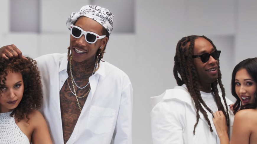 Ty Dolla $ign & Wiz Khalifa dancing with two women. Clip from their video Brand New