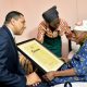Andrew Holness gives award to Violet Mosse-Brown for world's oldest living person