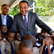 Christopher Tufton interacts with students of the Brown’s Hall Primary School handing over expansion project