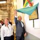 Andrew Holness unveils a plaque at the new production facility