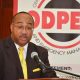 ODPEM director talking in a microphone about being disaster ready to Vision Newspaper Caribbean News