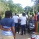 Crowd gathered where missing women's body found in a shallow grave shown to Vision Newspaper Caribbean News
