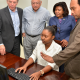 Minister of justice trying out the new CISS system captured by Vision Newspaper Jamaican News